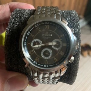 Invicta watch used a few times excellent condition silver w/ black dial